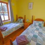 Ground floor twin bedroom at Achill Cottages